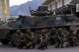 Suíços rejeitam fim do serviço militar e anunciam proibição do véu no país