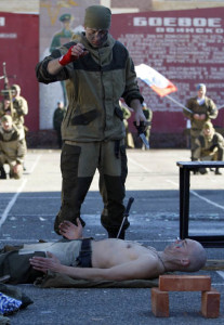 Members of a special forces unit under the military intelligence service take part in a demonstration of skills in Stavropol
