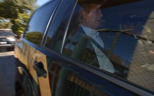 dirceu no carro da pf