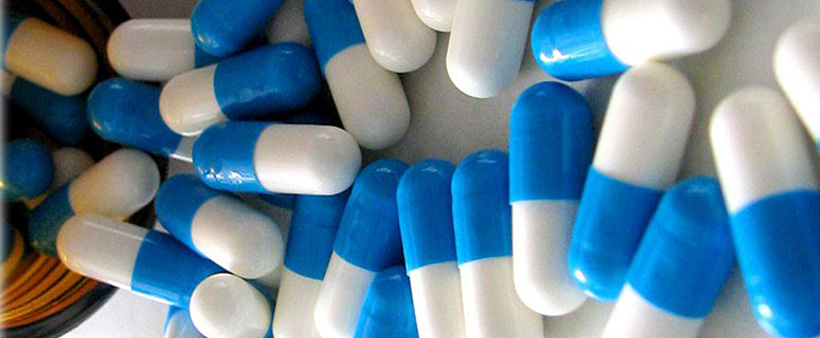comprimidos azul e branco