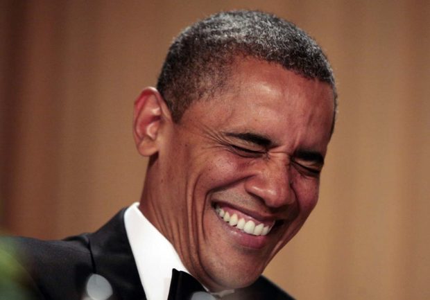 obama rindo