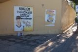 Homem rasga cartaz com foto de Alisson Henrique e lança veículo contra portão do Colégio Auxiliadora