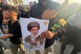 Funeral do aiatolá Ali Khamenei tem afluência maciça de fiéis em Teerã Funeral do aiatolá Ali Khamenei tem afluência maciça de fiéis em Teerã